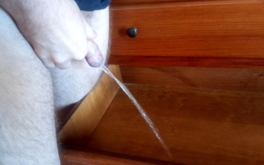 John is pissing it all into the drawer