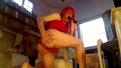 My fucking ass and dressed in red with a red wig