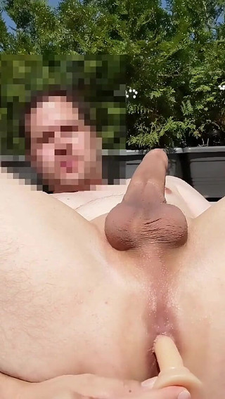 Male Slut Plays with Dildo in Backyard as He Jerks off Soaked in Piss