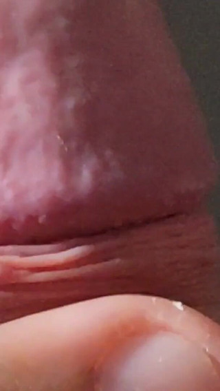 Amazing Close-up of the Penis Crown and Feet in the Background.
