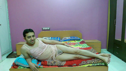 Sexy sissy crossdresser femboy Sweet Lollipop in pink lingerie and thong inside it.