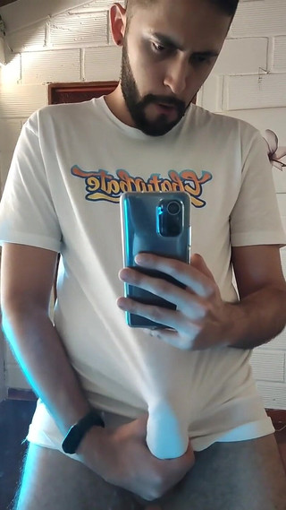 Jerking off and cumming through my white t-shirt