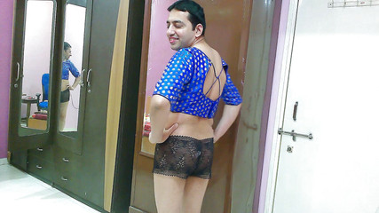Sweet sissy crossdresser femboy Sweet Lollipop in a top and shorts.