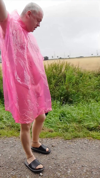 In Rain Cape, Tights and Slippers in the Drizzle