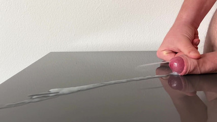 Huge Cumshot on Reflecting Table After Days of Edging