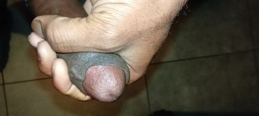 Relaxing with Hand in the Bathroom