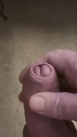 My Friend Sits in a Chair and Jerks off His Cock While Watching Video