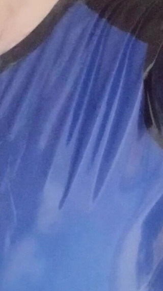 Latex Boy in Blue Black Latex Swimwear in the Shower